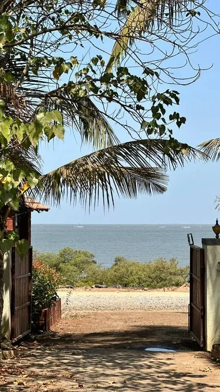 Gates of The Seascape opening onto the sea